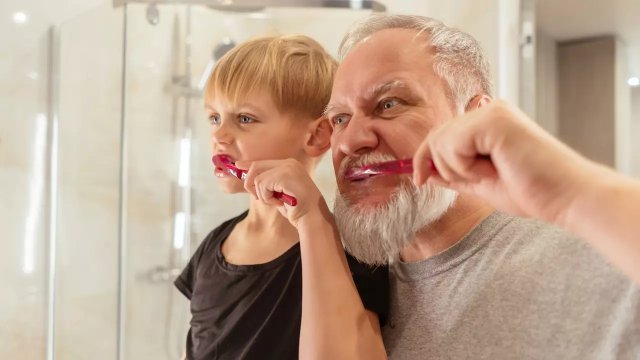 Image of a person brushing their teeth gently with a soft-bristled toothbrush to promote gum health.