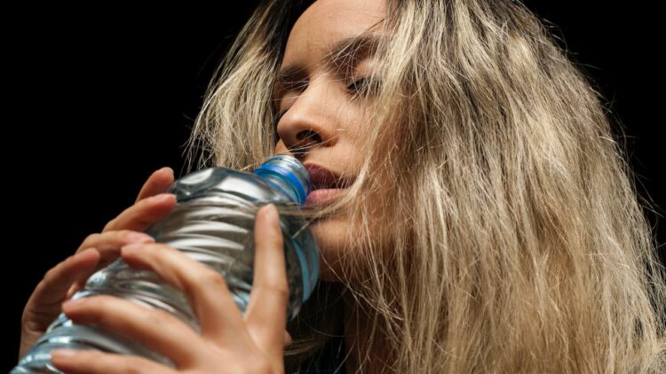 Sipping Water from Plastic Bottles